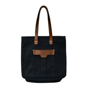 Black waxed canvas tote with brown leather accents