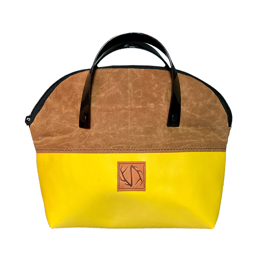 front of yellow and brown travel tote